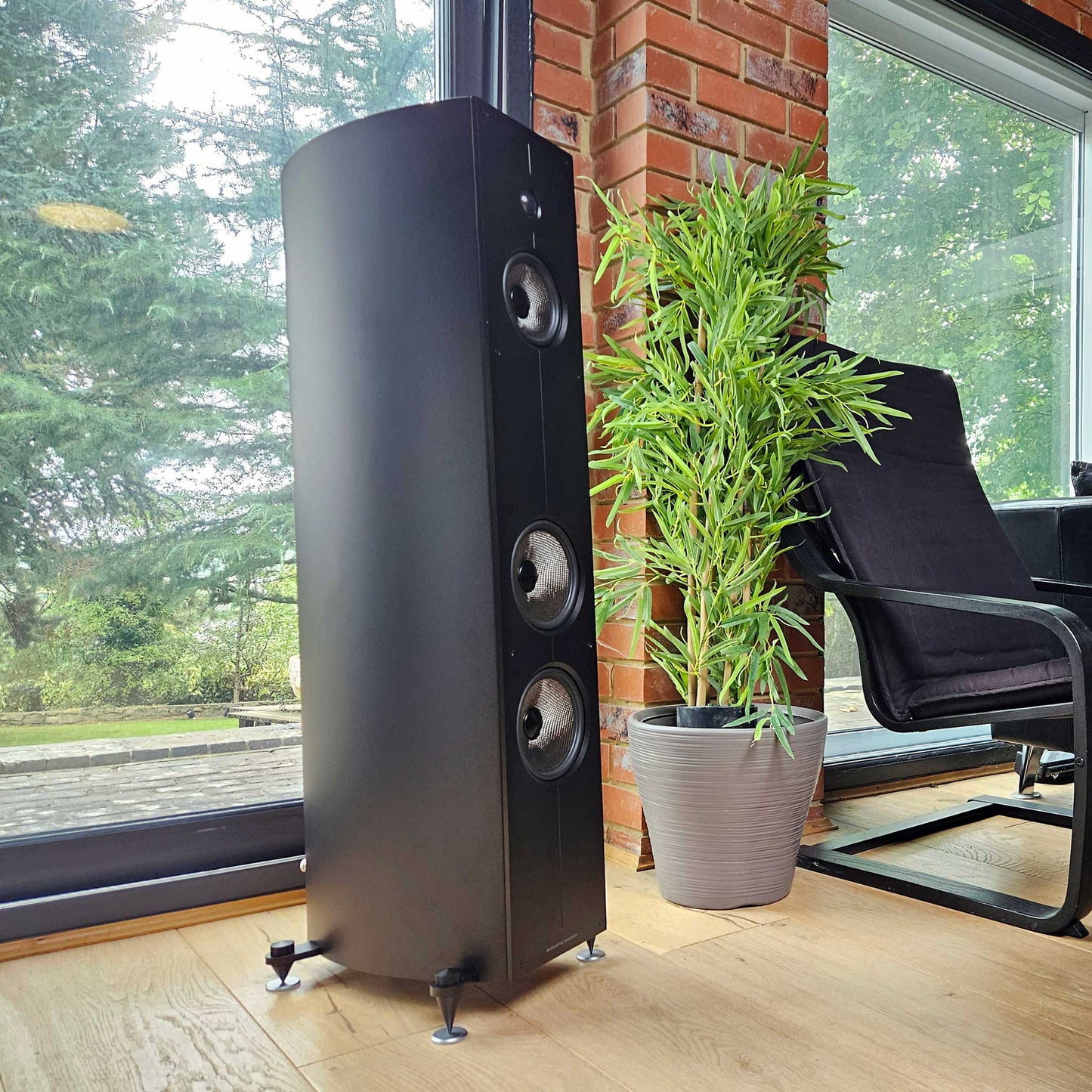 Acoustic Energy Corinium Matte Black Room Setting