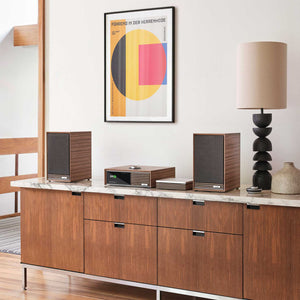 Ruark Audio R-CD100 with R610 on sideboard