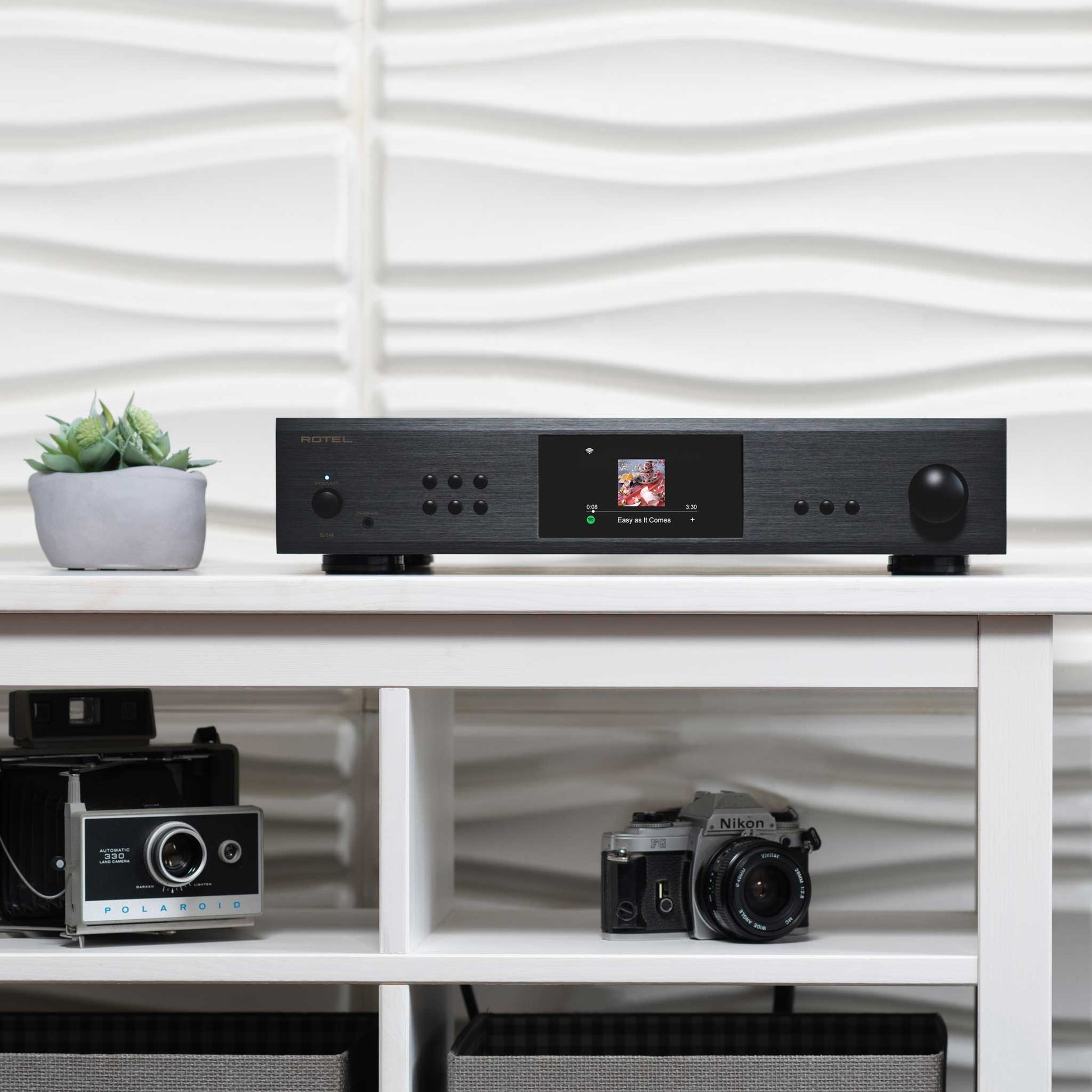 Rotel S14 Black On Shelf